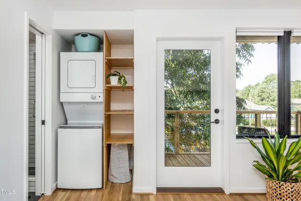 a view of front door and bedroom