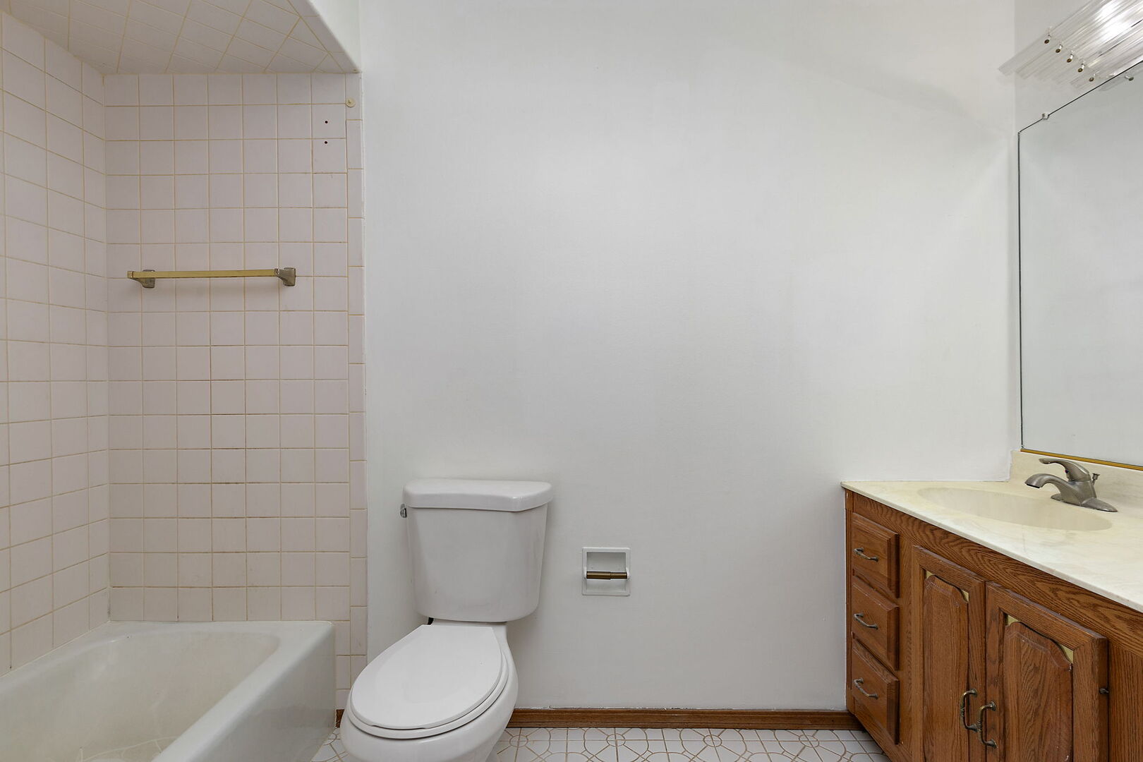 1874 Ranchview Drive Naperville, IL 60565 - Photo 15 of 21 a bathroom with a sink a toilet and shower