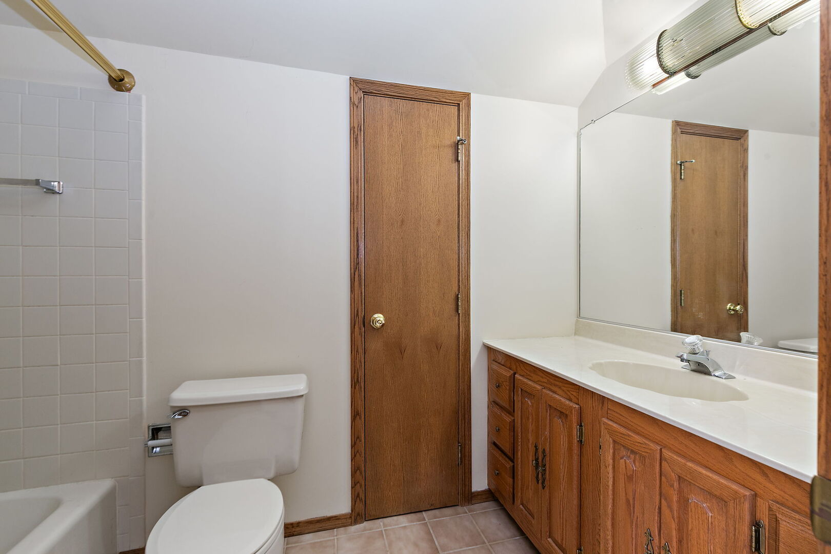 1874 Ranchview Drive Naperville, IL 60565 - Photo 18 of 21 a bathroom with a sink a toilet and shower