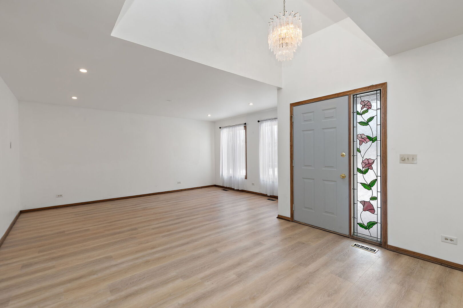 1874 Ranchview Drive Naperville, IL 60565 - Photo 2 of 21 a view of an empty room with a window