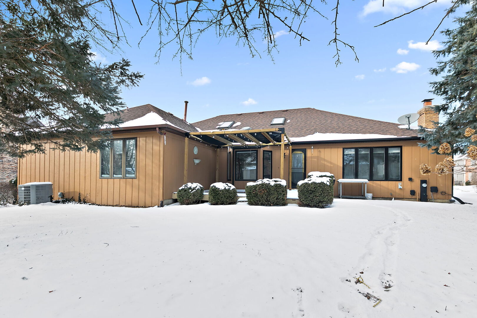 1874 Ranchview Drive Naperville, IL 60565 - Photo 21 of 21 a view of a house with snow in front of house