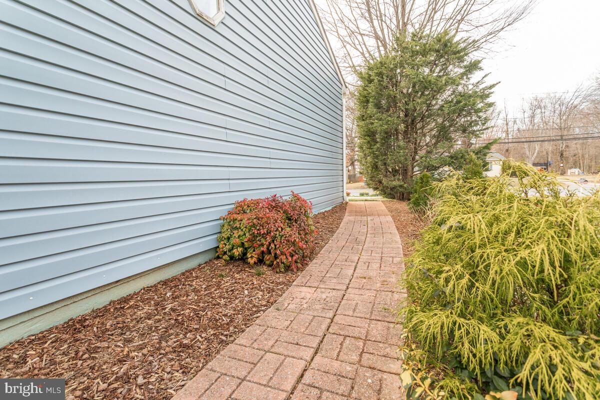 407 North Hammonds Ferry Road Linthicum, MD 21090 - Photo 60 of 60 walkway goes around the entire house