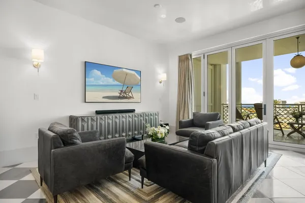 a bathroom with a tub sink and shower