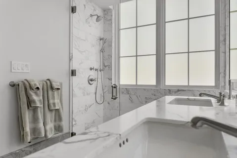 a view of a hallway with washer and dryer