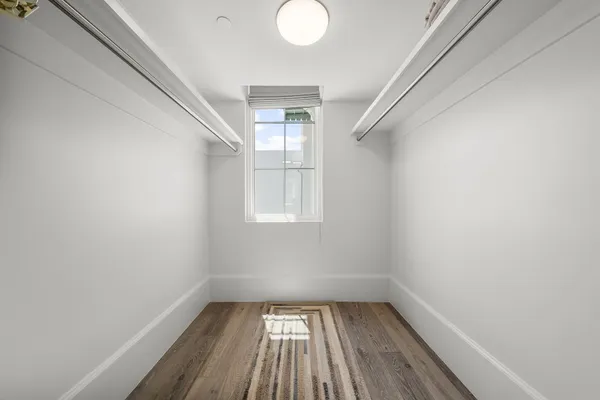 a bathroom with a sink and a washer