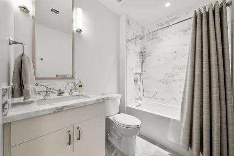 a view of a living room and hardwood