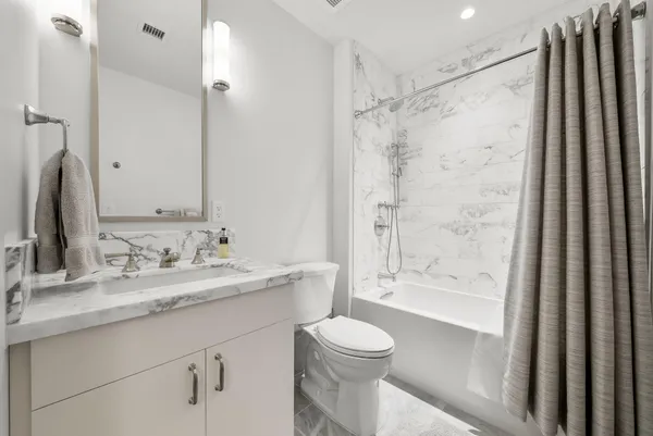 a view of a living room and hardwood