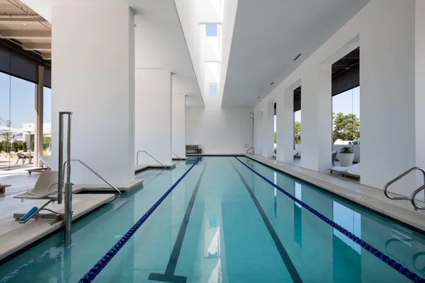 a view of a palm trees in front of a building