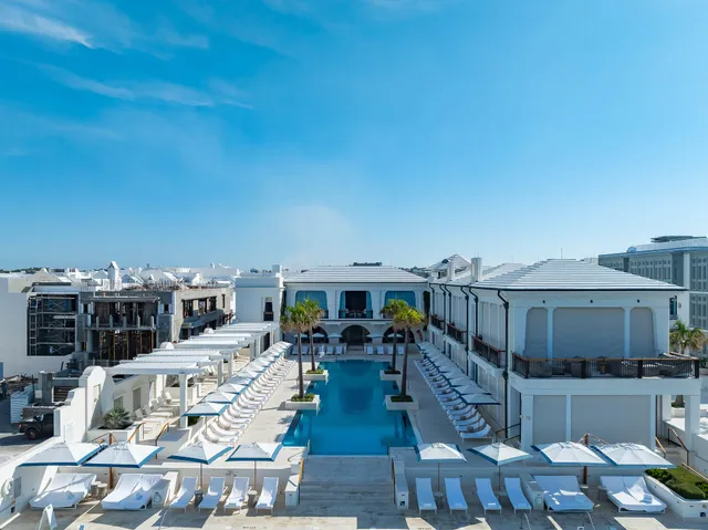 a outdoor space with lots of table and chairs