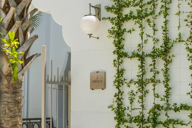 a view of a terrace with furniture and front door