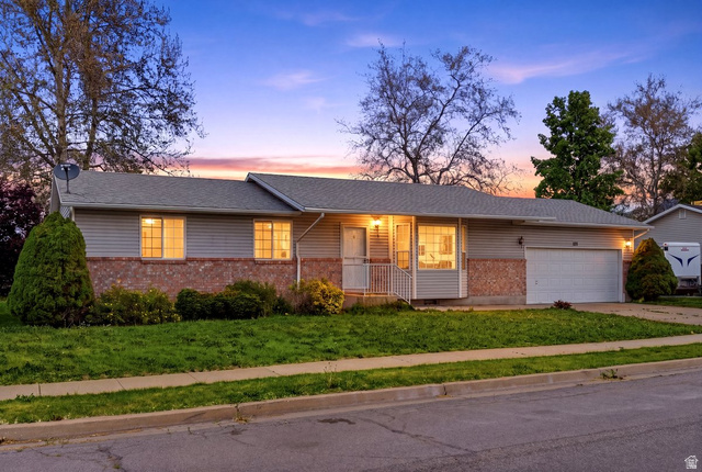 Undisclosed Address Layton, UT 84041 - Photo 1 of 1 Ranch-style residence featuring a brick and siding exterior