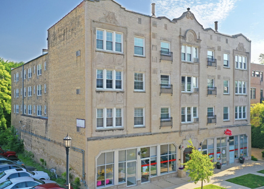 829 Foster Street, Unit 304 Evanston, IL 60201 - Photo 1 of 2 a front view of a multi story building