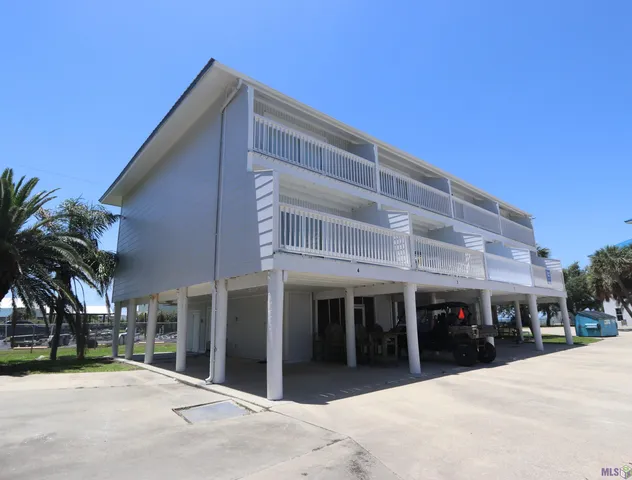 $235,000 | 411 Admiral Craik Drive, Unit 4, Grand Isle, LA 70358