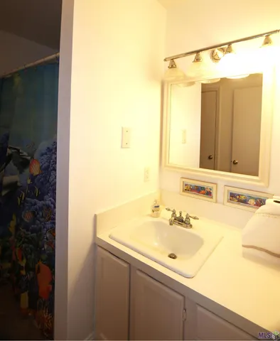 $235,000 | 411 Admiral Craik Drive, Unit 4, Grand Isle, LA 70358