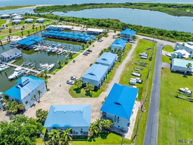$235,000 | 411 Admiral Craik Drive, Unit 4, Grand Isle, LA 70358