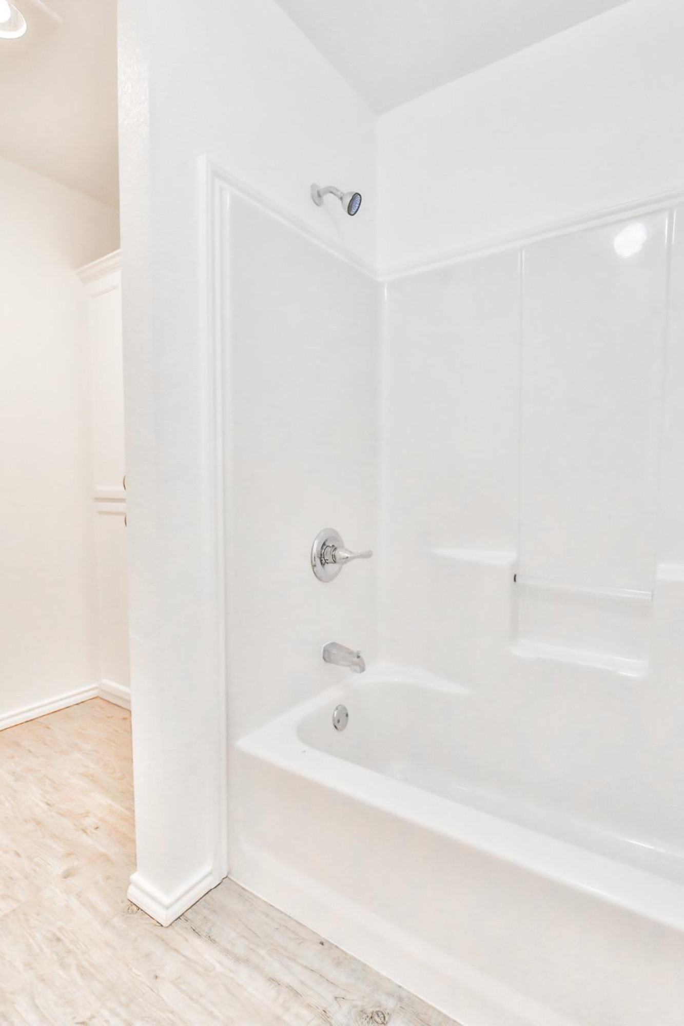 5710 Grinnell Street Lubbock, TX 79416 - Photo 12 of 21 a bathroom with a bathtub