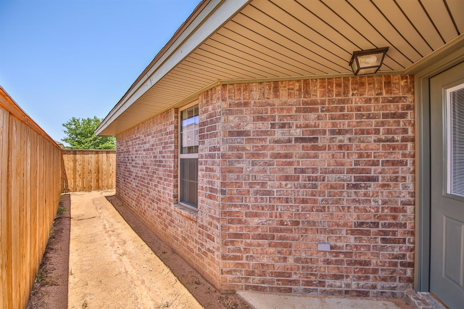 5710 Grinnell Street Lubbock, TX 79416 - Photo 21 of 21 a backyard of a house