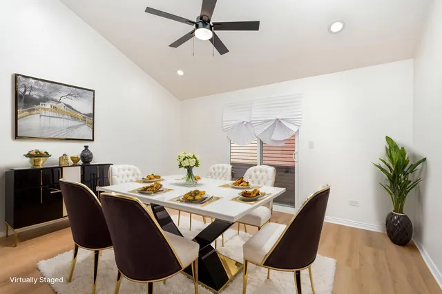a view of a dining room with furniture