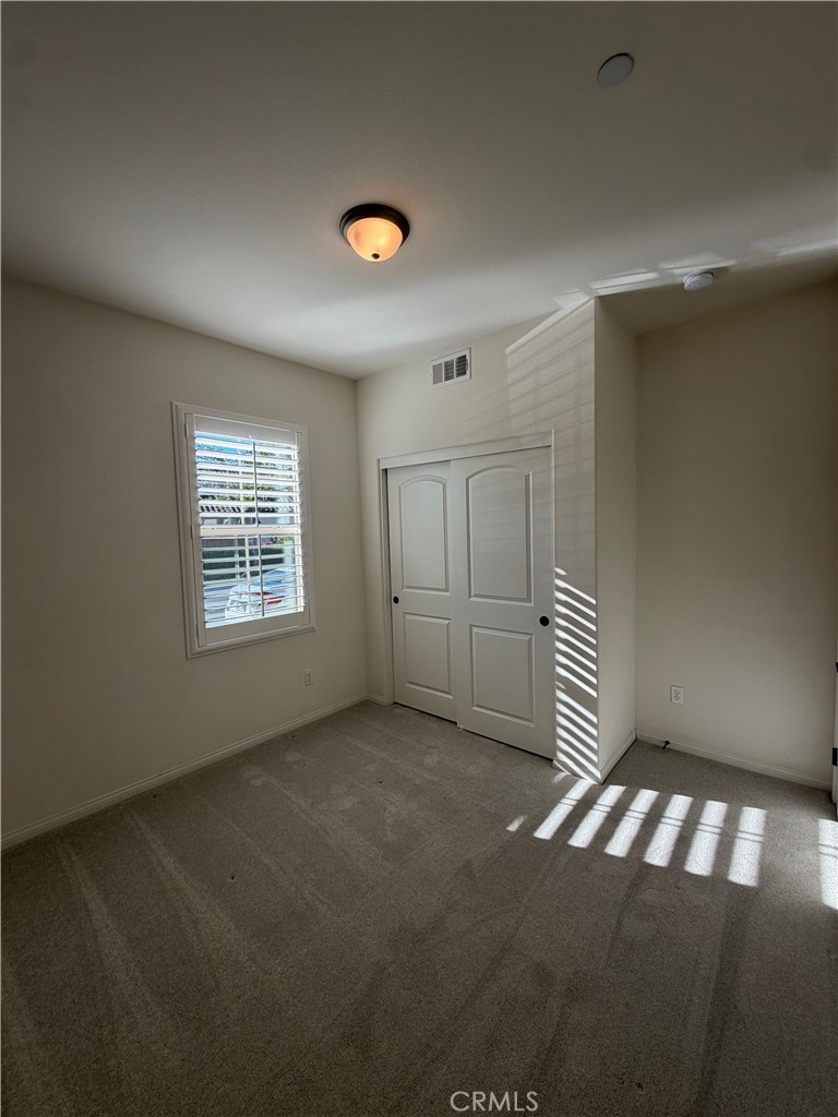15 Galan Street Rancho Mission Viejo, CA 92694 - Photo 11 of 24 a view of an empty room with a window