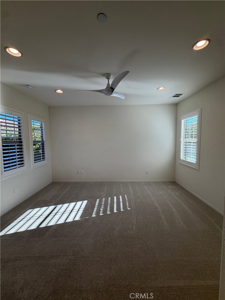 15 Galan Street Rancho Mission Viejo, CA 92694 - Photo 16 of 24 a view of an empty room and window