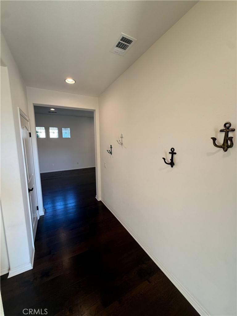 15 Galan Street Rancho Mission Viejo, CA 92694 - Photo 4 of 24 wooden floor in a hall with an entryway