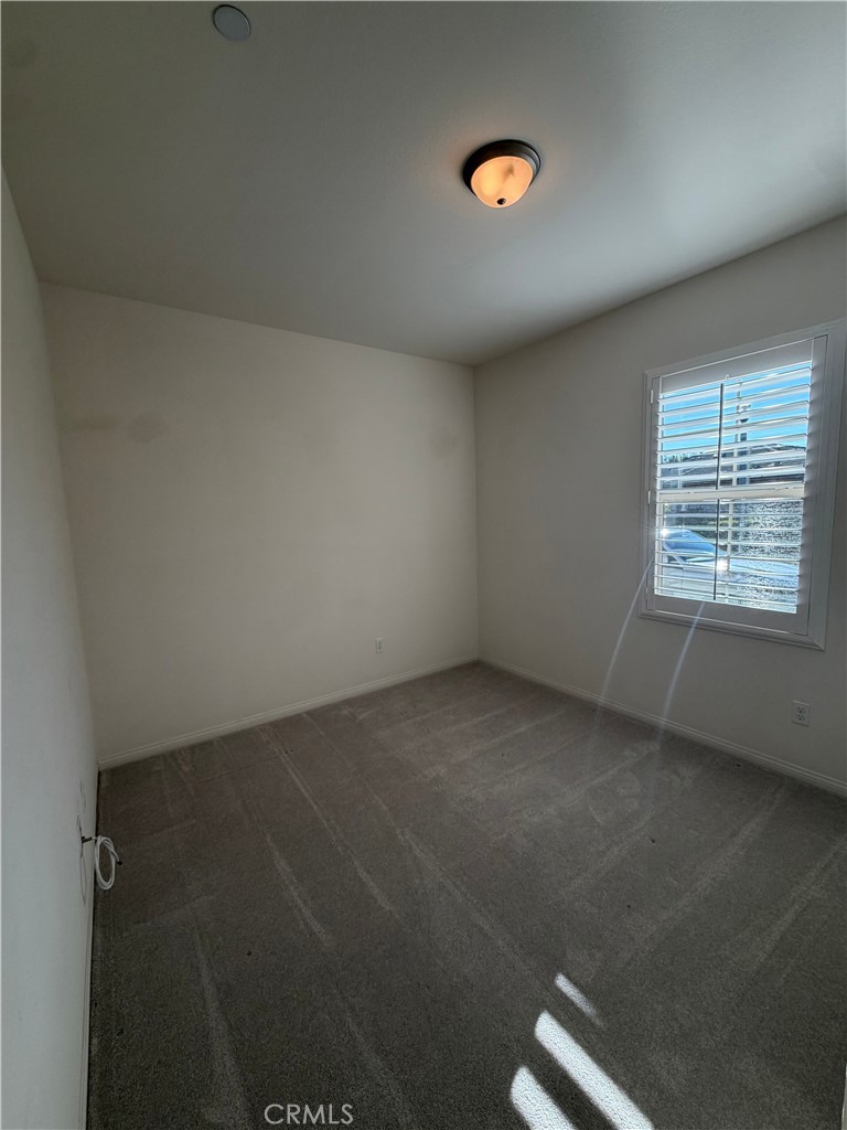 15 Galan Street Rancho Mission Viejo, CA 92694 - Photo 10 of 24 an empty room with a window