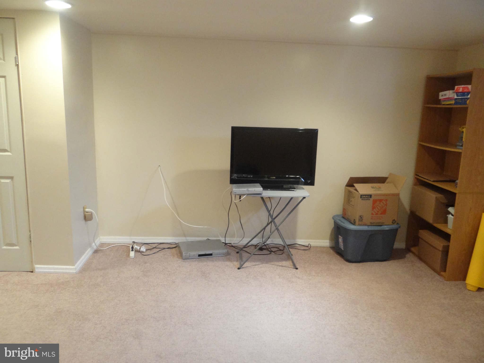 1287 Cedarcroft Road Baltimore, MD 21239 - Photo 16 of 21 Lower level family room - another view