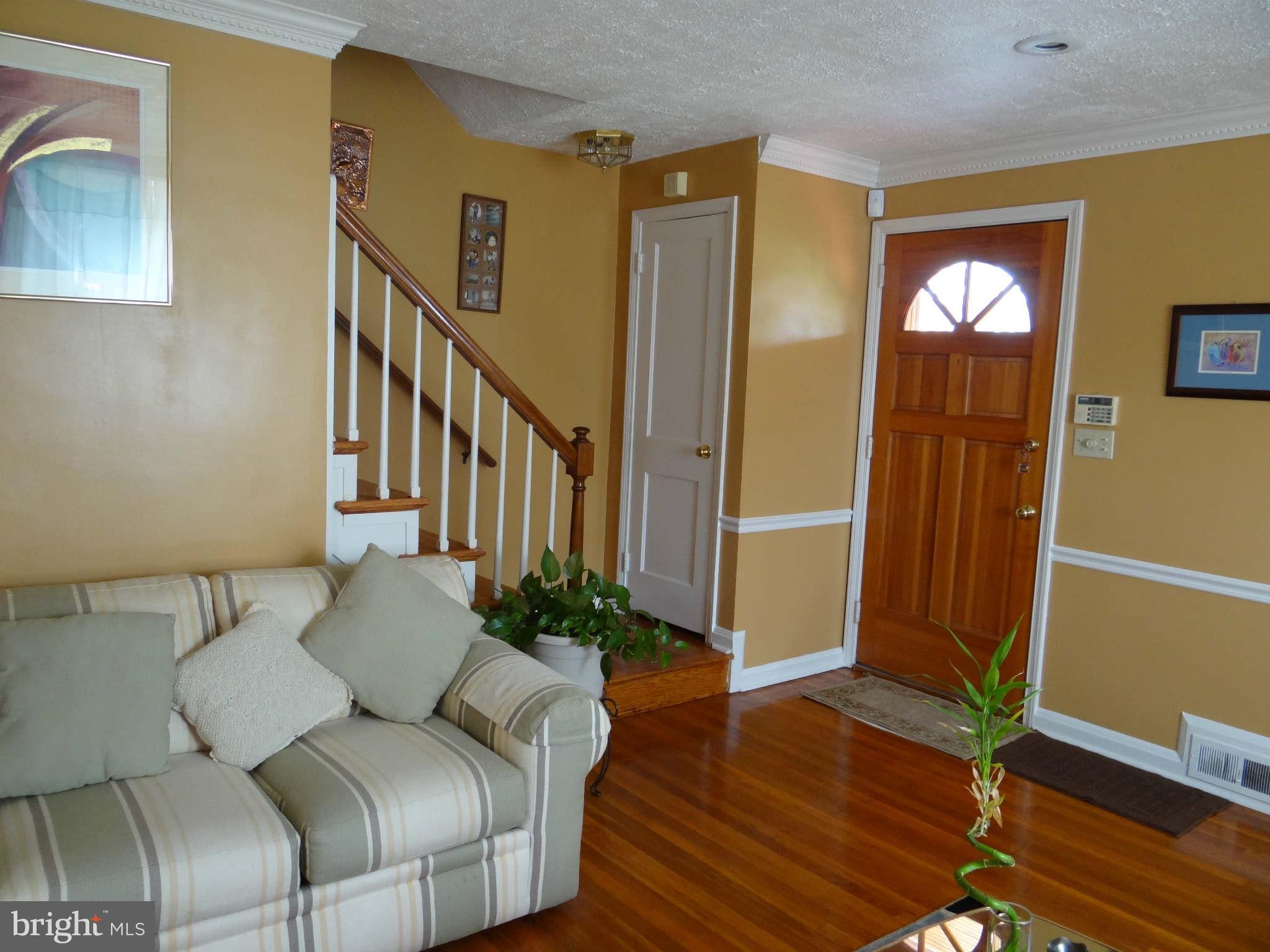 1287 Cedarcroft Road Baltimore, MD 21239 - Photo 3 of 21 Living Room and Steps