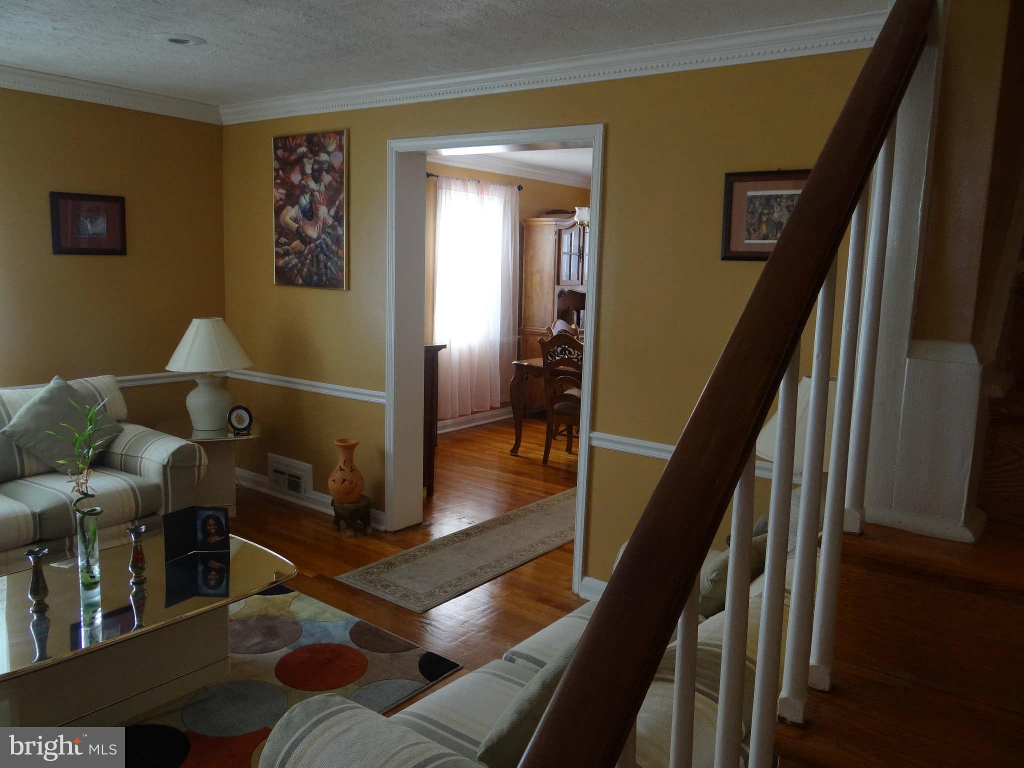 1287 Cedarcroft Road Baltimore, MD 21239 - Photo 5 of 21 Living room looking towards dining room