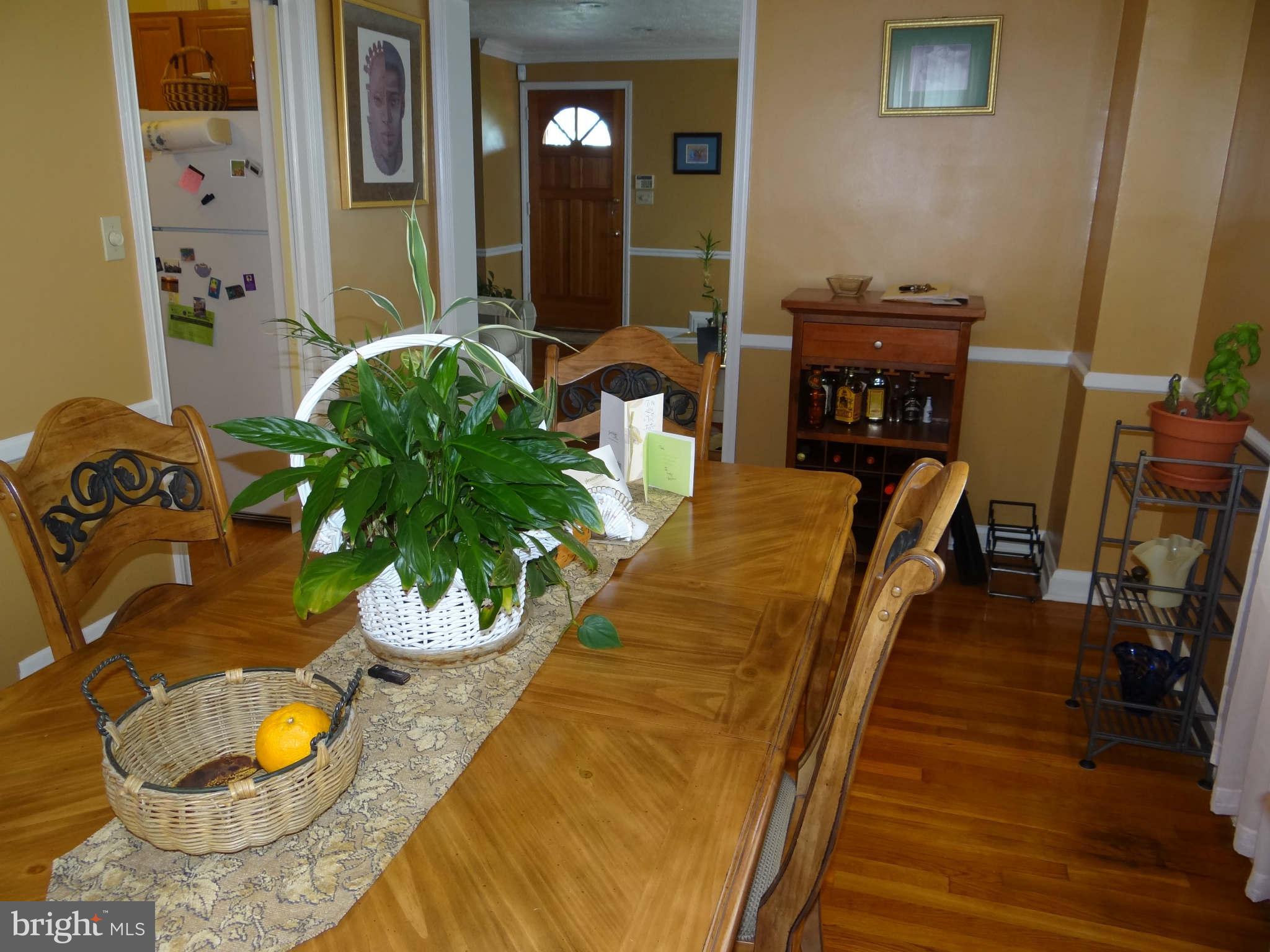1287 Cedarcroft Road Baltimore, MD 21239 - Photo 6 of 21 Dining room looking towards living room