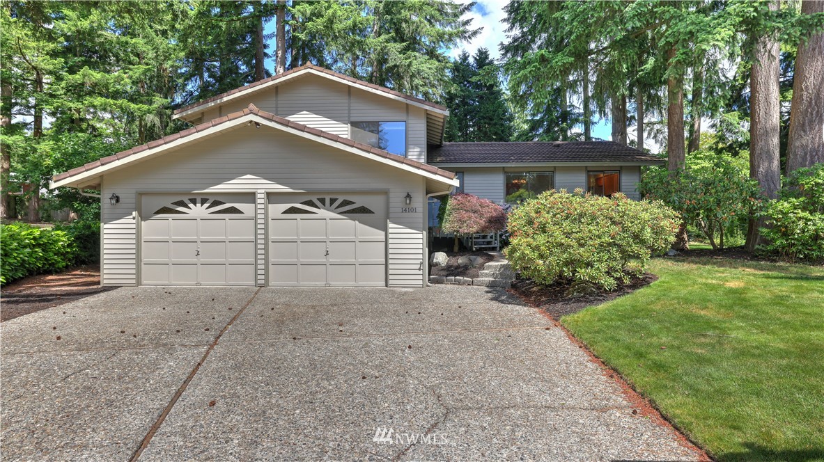 14101 148th Place Southeast Renton, WA 98059 - Photo 3 of 36 a house with trees in front of it