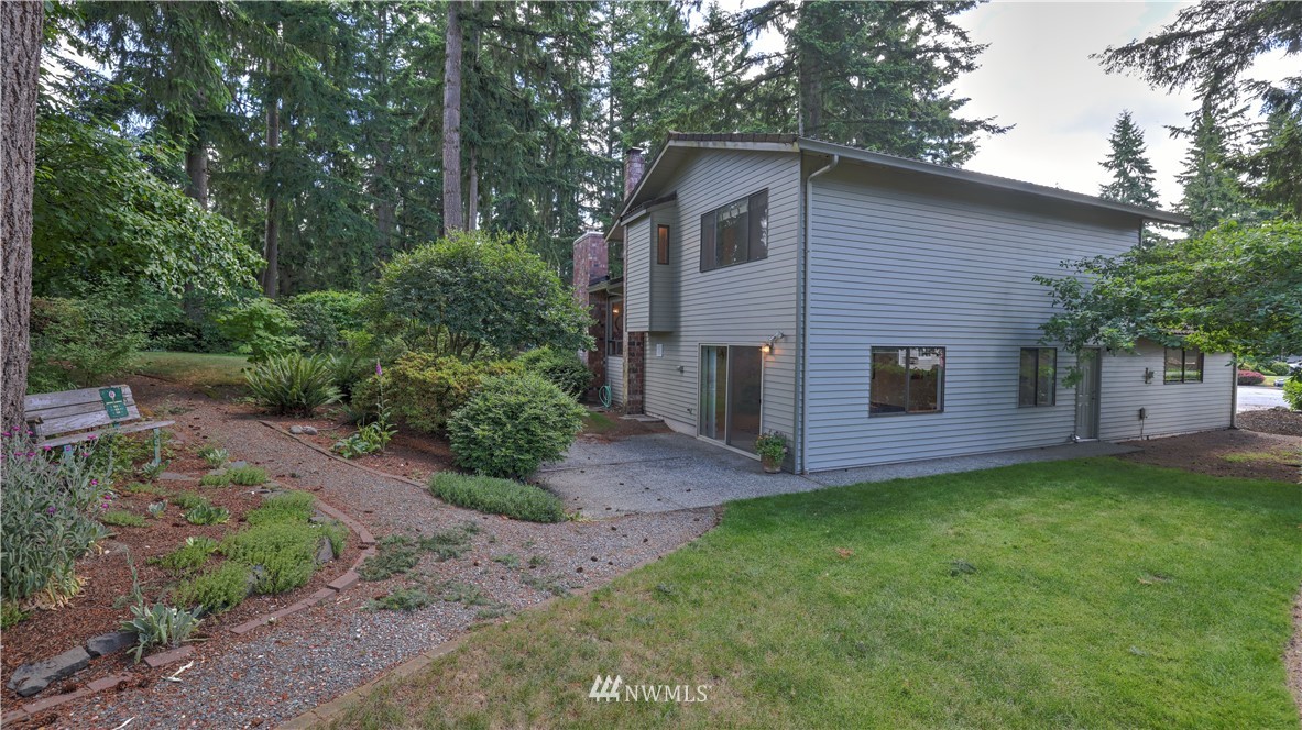 14101 148th Place Southeast Renton, WA 98059 - Photo 33 of 36 a view of a house with a yard