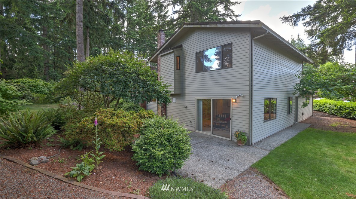 14101 148th Place Southeast Renton, WA 98059 - Photo 36 of 36 a view of a house with a yard and potted plants