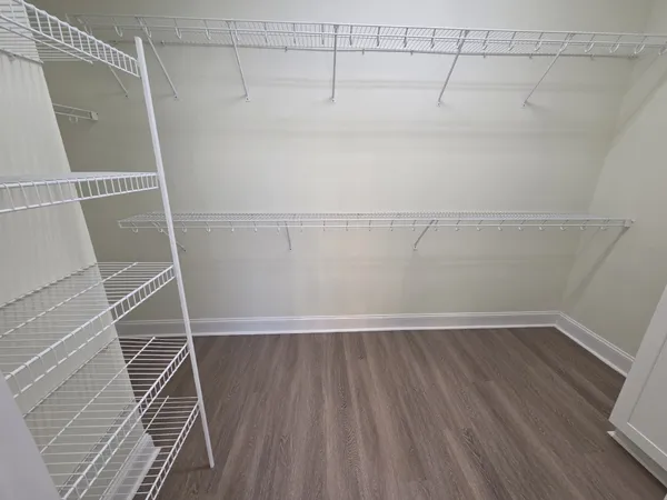 a view of a room with racks on the wall