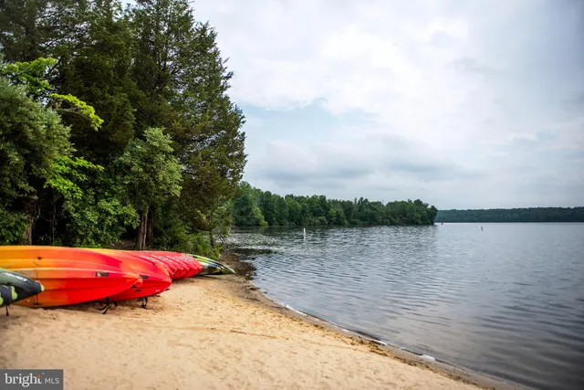 a view of a lake with sitting area
