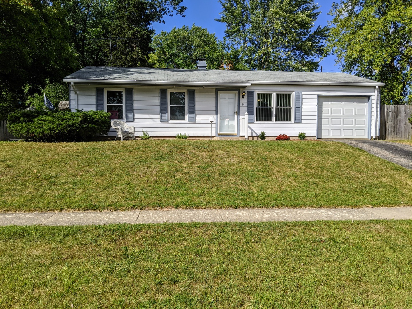 14 East Oltendorf Road Streamwood, IL 60107 - Photo 1 of 21 a front view of a house with swimming pool