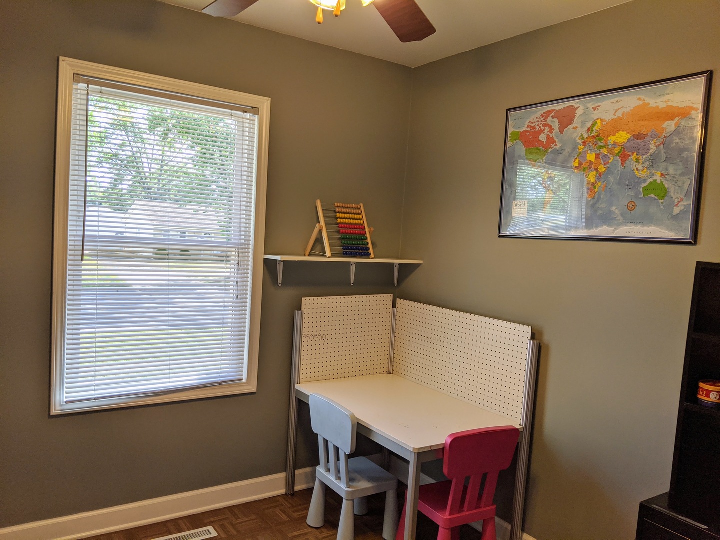 14 East Oltendorf Road Streamwood, IL 60107 - Photo 15 of 21 a view of a workspace with furniture and a window