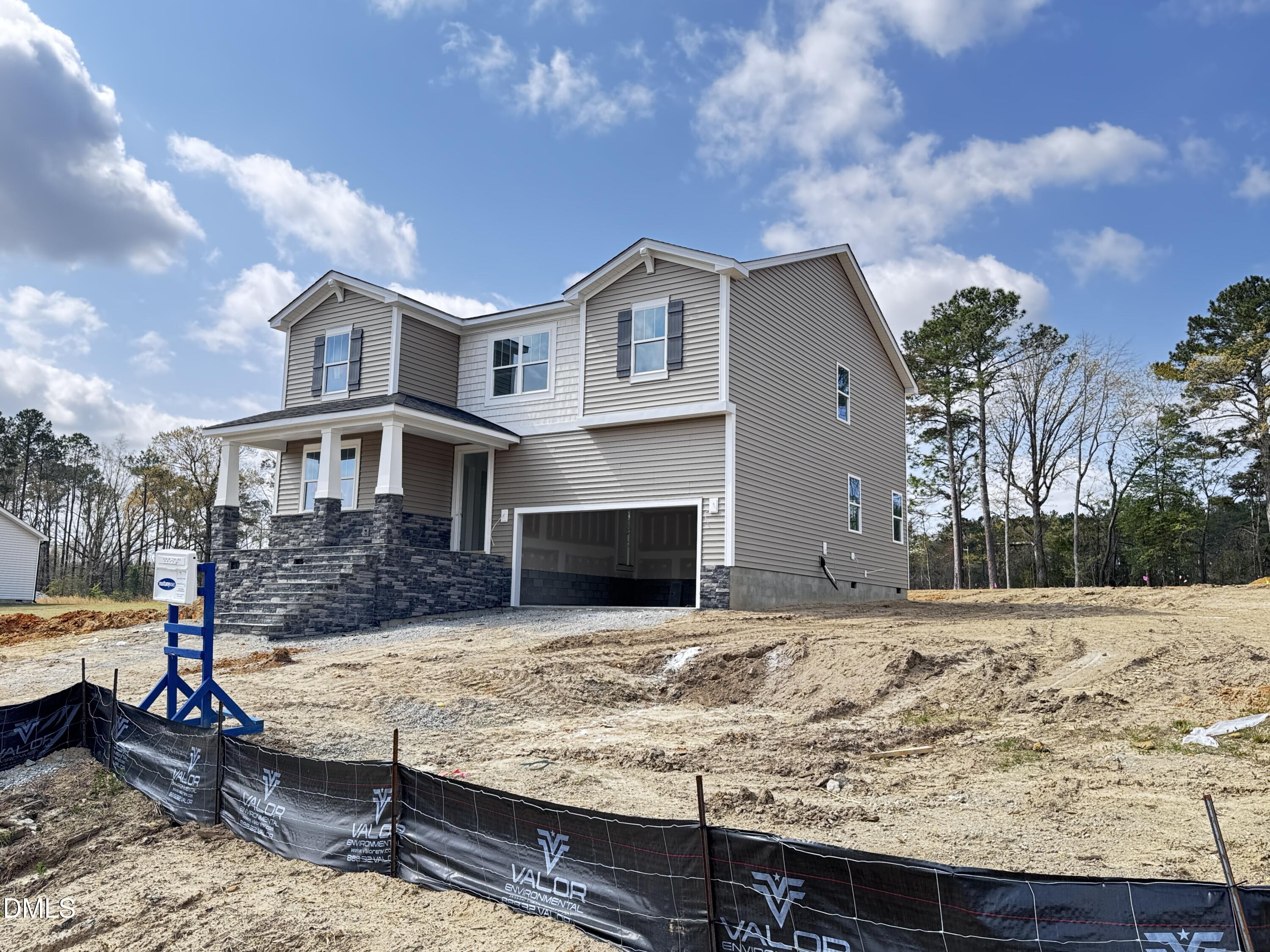 263 Kindness Drive Lillington, NC 27546 - Photo 2 of 37 a view of a house with a yard