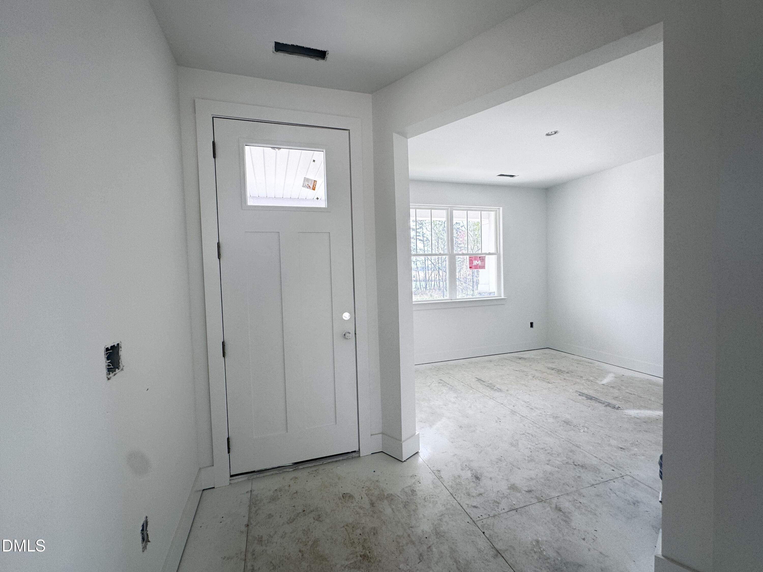 263 Kindness Drive Lillington, NC 27546 - Photo 3 of 37 an empty room with windows and closet