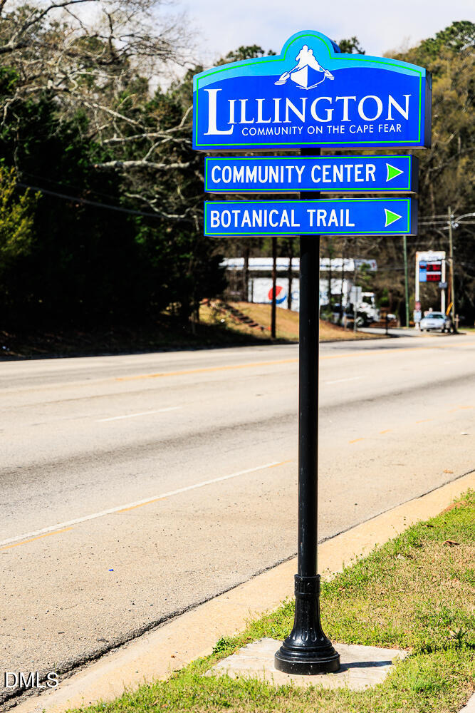 263 Kindness Drive Lillington, NC 27546 - Photo 35 of 37 a view of a street with an empty space
