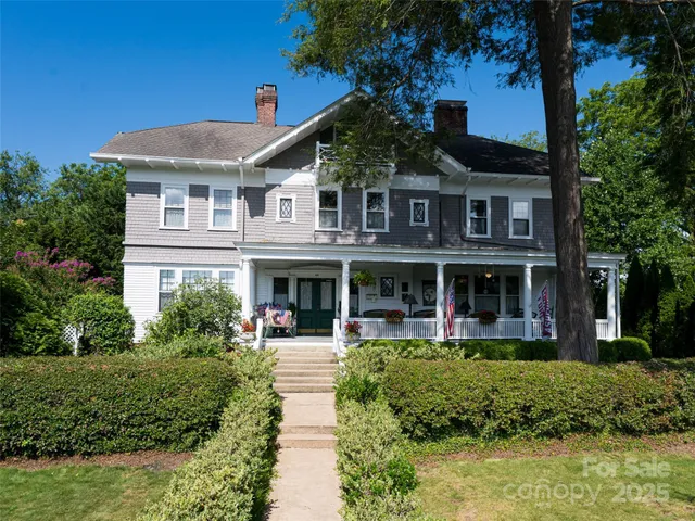 a front view of a building with garden