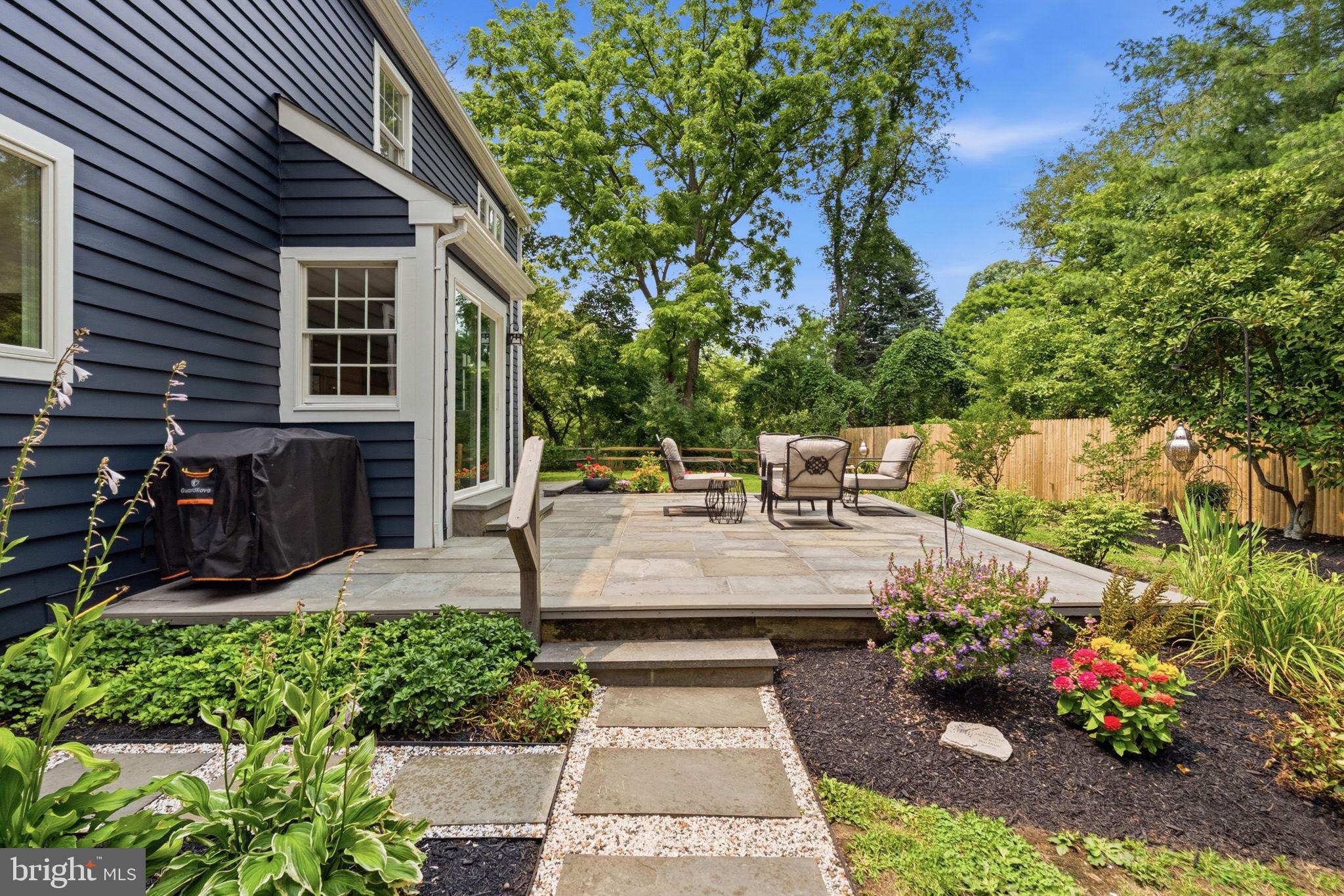 2971 Comfort Road New Hope, PA 18938 - Photo 56 of 60 a view of a patio with table and chairs potted plants and large tree