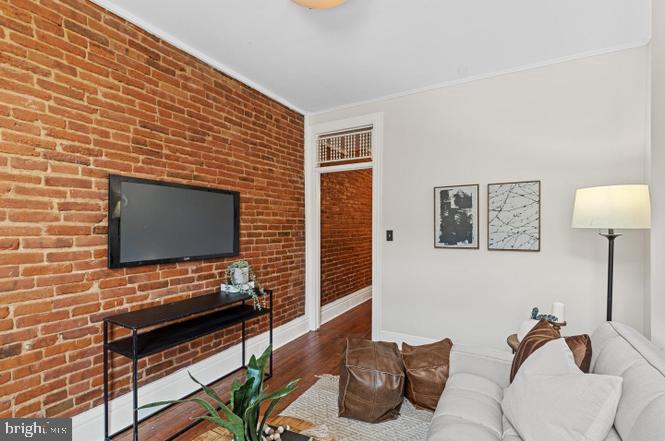 1444 Henry Street Baltimore, MD 21230 - Photo 6 of 18 Charming urban retreat with exposed brick.