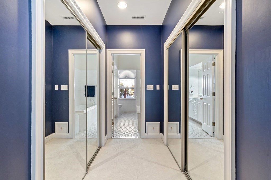 49 Rawson Road, Unit 49 Brookline, MA 02445 - Photo 20 of 42 a bathroom with a tub and shower