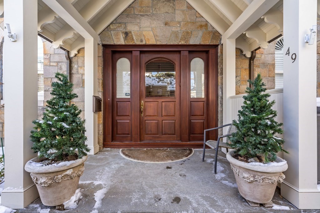 49 Rawson Road, Unit 49 Brookline, MA 02445 - Photo 2 of 42 a couple of potted plants in front of door