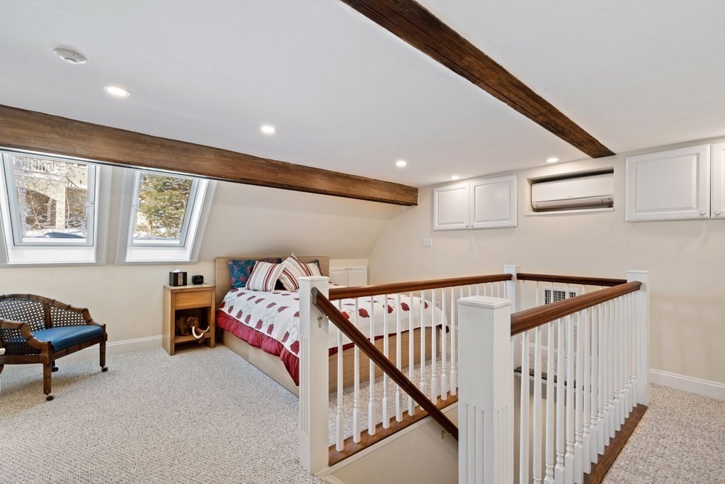 49 Rawson Road, Unit 49 Brookline, MA 02445 - Photo 26 of 42 a view of an entryway with furniture