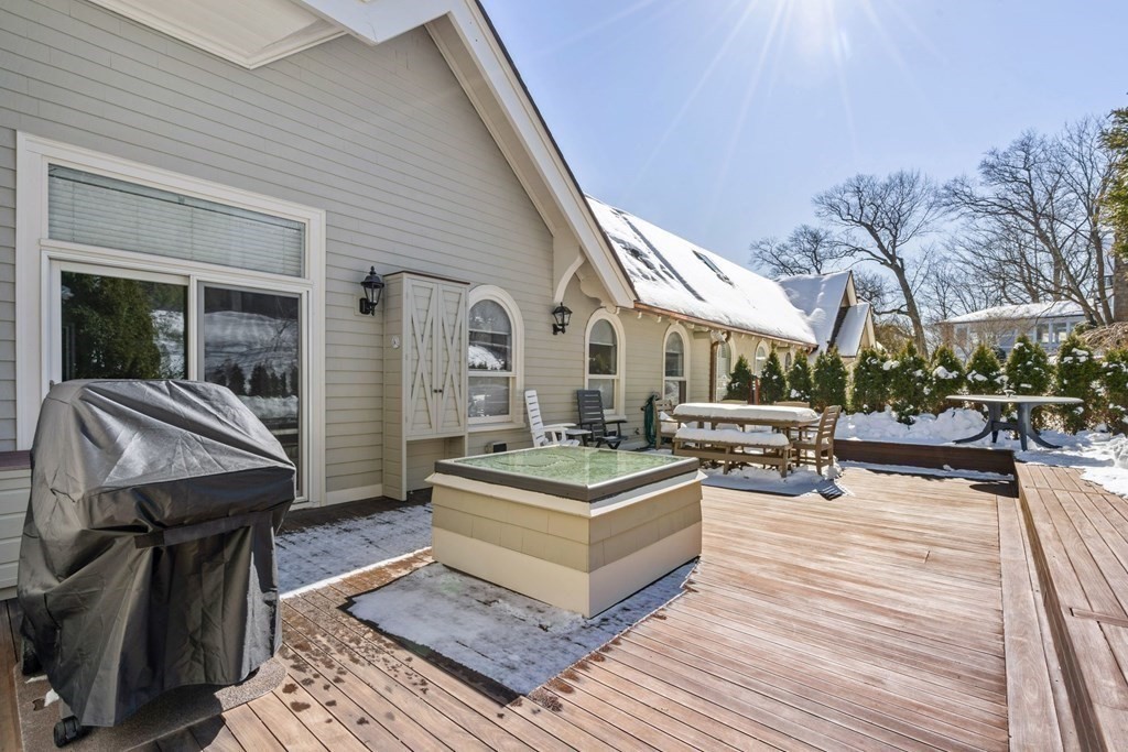 49 Rawson Road, Unit 49 Brookline, MA 02445 - Photo 30 of 42 a view of a dinning table and chairs in the patio