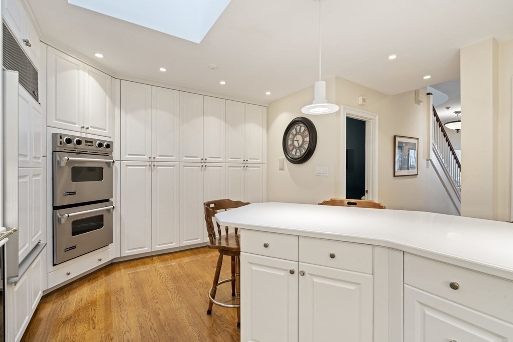 49 Rawson Road, Unit 49 Brookline, MA 02445 - Photo 8 of 42 a kitchen with cabinets and stainless steel appliances