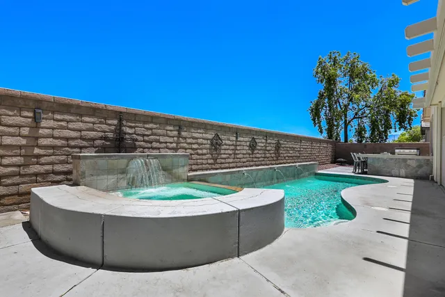 a view of a fountain in the patio with a fountain