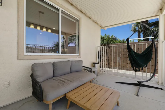 a view of a living room and a wooden floor